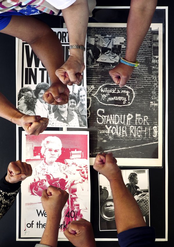 Fists gathered in a circle