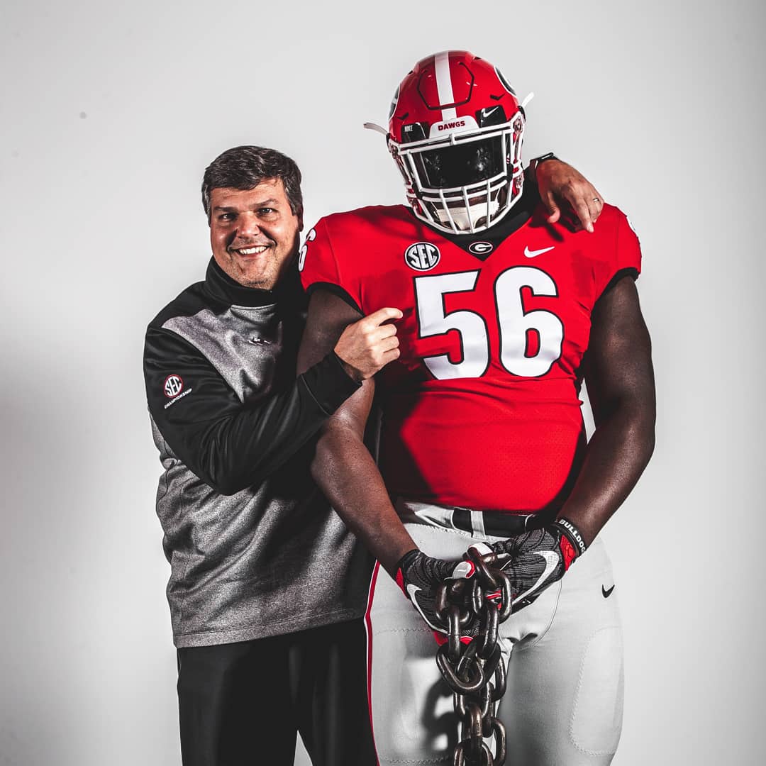 Photo: Georgia offensive line coach Matt Luke (left) with Micah Morris (Right) on an unofficial visit to UGA | Photo from Micah Morris' Twitter