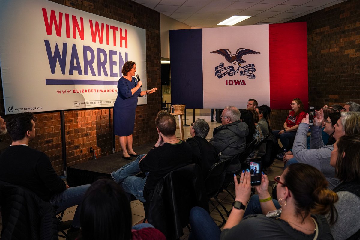 Rep. Katie Porter speaks to a crowd of Elizabeth Warren supporters at a Sioux City town hall.