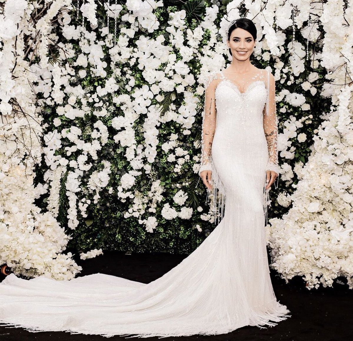 We just can’t get enough of <a href="/AdelinaPestritu/">Adelina Pestritu</a> Riva gown by <a href="/pronovias/">Aria</a> 💕 The cascading beads to the back of the dress adds drama to this beautifully unique design.👰 #pronoviasbride