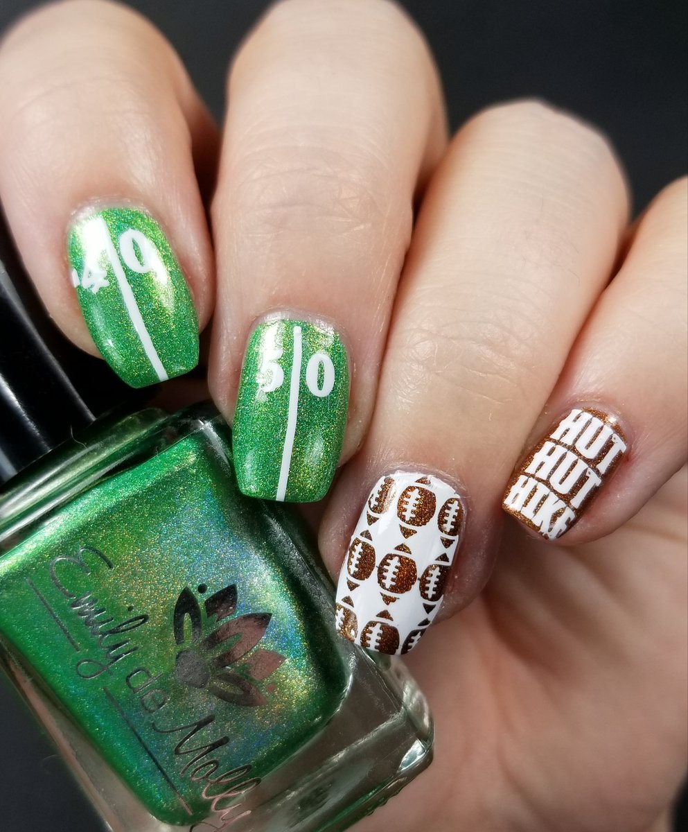Superbowl!! Unfortunately my team isn't in it but I wanted to do some football nails 🏈 products used: <a href="/EmilydeMolly/">Hayley</a> The Last Stand <a href="/glistenandglow1/">Jill ~Glisten & Glow</a> Turkey Trot &amp; Tailgating <a href="/uberchicbeauty/">UberChic Beauty</a> Essential White and Uber Mini: Football Is Life <a href="/holotaco/">Holo Taco 💿🌮</a> Peely Base and Super Glossy Taco