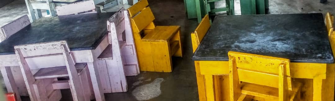 BeAhummingbird's tweet photo. Freshly painted chalkboard desktops in the early childhood classroom (great alternative to paper)! All the good changes happening at Mukwashi Trust School in 2020 are thanks to the people who supported our end-of-year fundraiser (https://t.co/YWSMihIev4) @bridgepeacehope https://t.co/RcDWNBZfbp