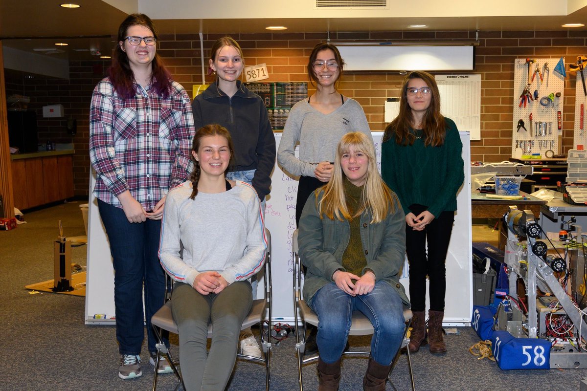 Six high school women pose for camera