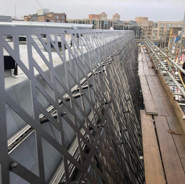 Great the see the perforated aluminium cladding on the CLT mansard nearing completion in Hackney Wick. We added this floor over an old theatre and club.... Can't wait to see it when the scaffold is dropped. GSB London have done a good job on the tricky installation