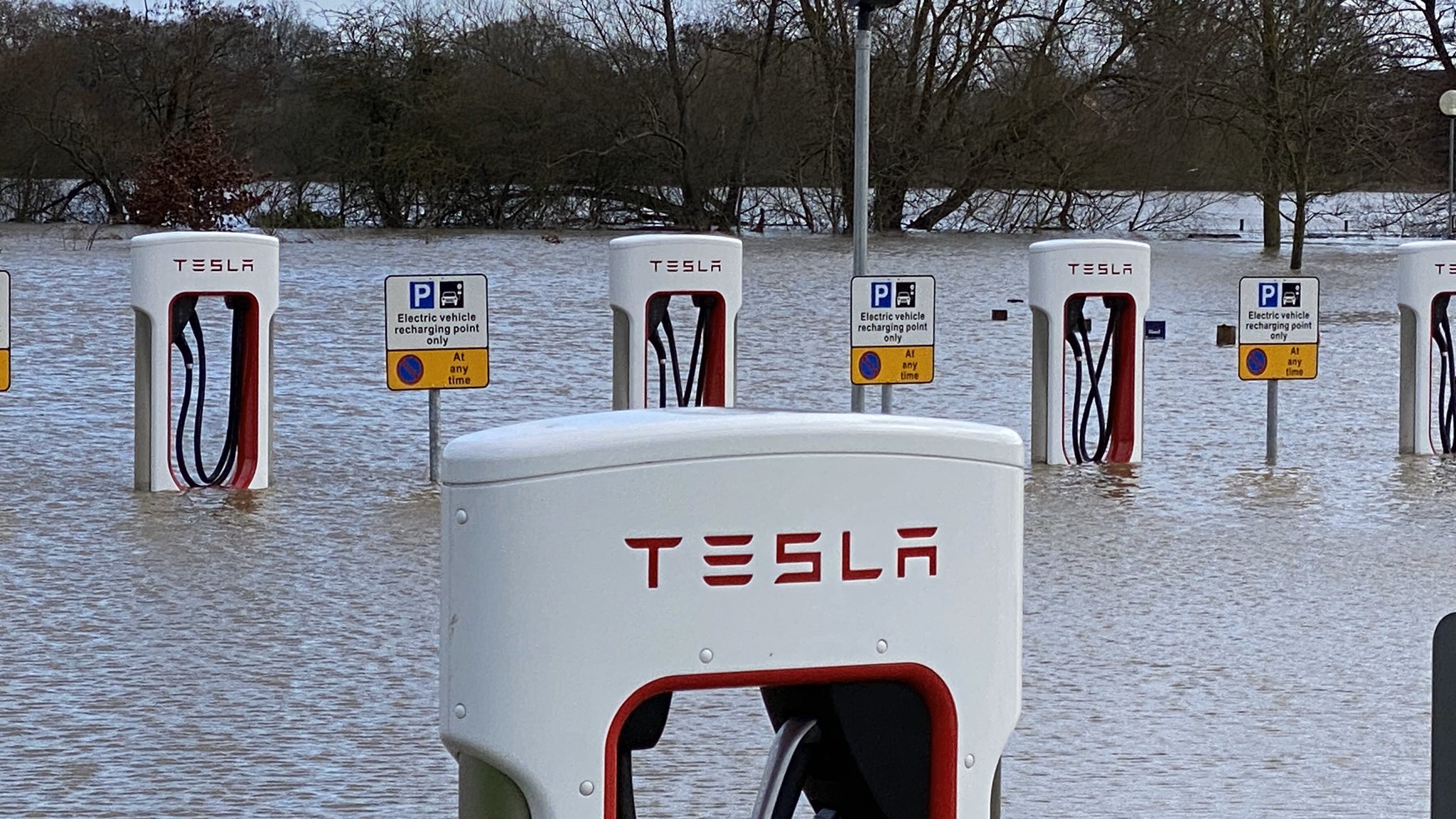 Wokingham.Today on X Oops It did it again the Tesla charging point at Sindlesham is underwater again today wokingham https t 6rgXzEh4sH X