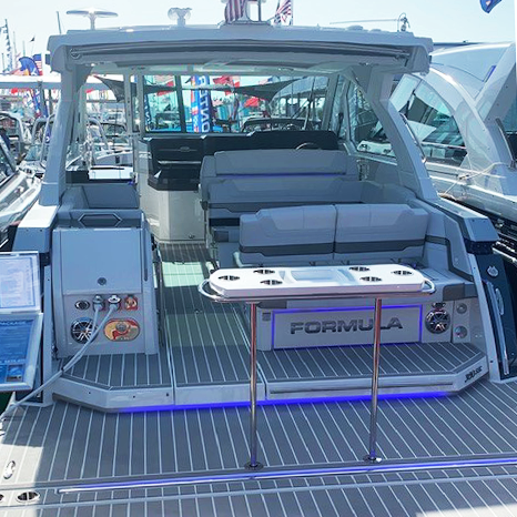 PlasDECK's tweet image. The combination of blue lighting and cold shades of PlasDECK decking will keep you cool on a hot day. We have a wide variety of decking colors and custom inlays to highlight the beauty of your boat. #formulaboats #plasdeck #miamiboatshow #MIBS2020 #yachts