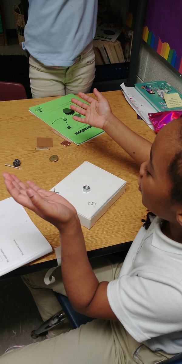 DCollier5's tweet photo. Where is the magnet hidden? Third grade @PriceOwls trying to locate magnets hidden in a box. https://t.co/Kh5sE8sFWl