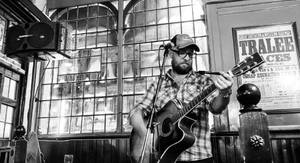 Tonight's live music comes from Chris Kelly.