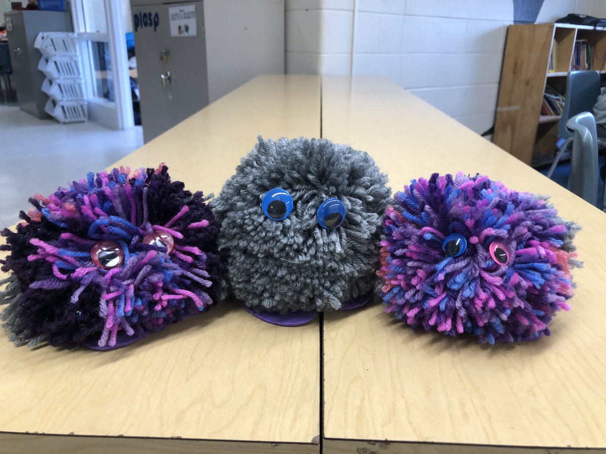 Children keeping their hands busy making pom pom monsters in the SAC program #plasp