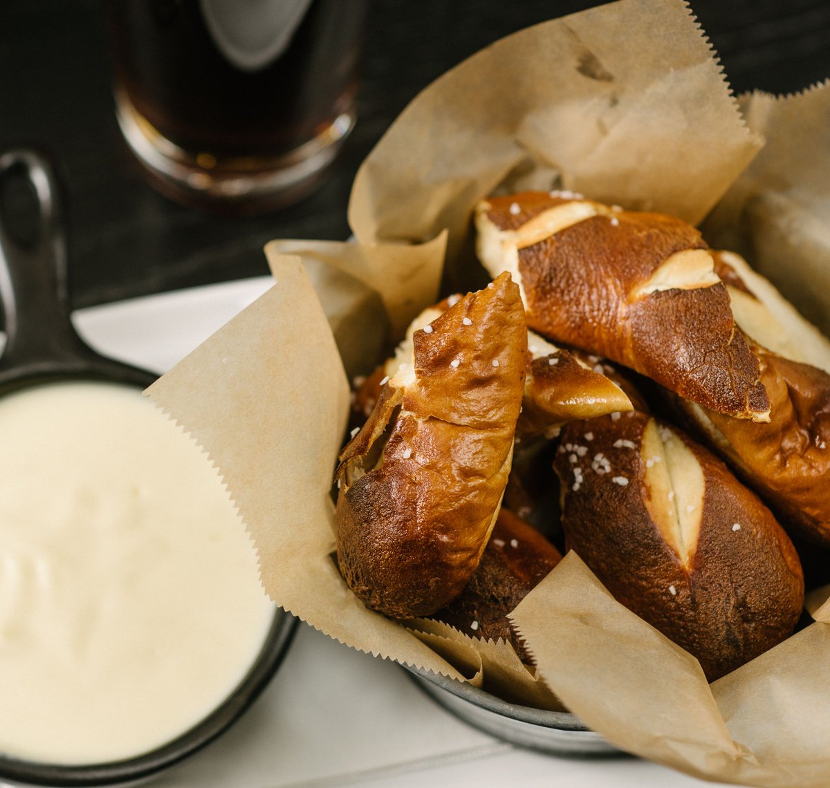 Trust us... you're gonna want these tonight. We serve our late night menu until 12am so you can stop by after a night out downtown. 🌙🌟

Pictured: warm soft pretzels with Samuel Adams lager cheddar cheese dip 😋🥨