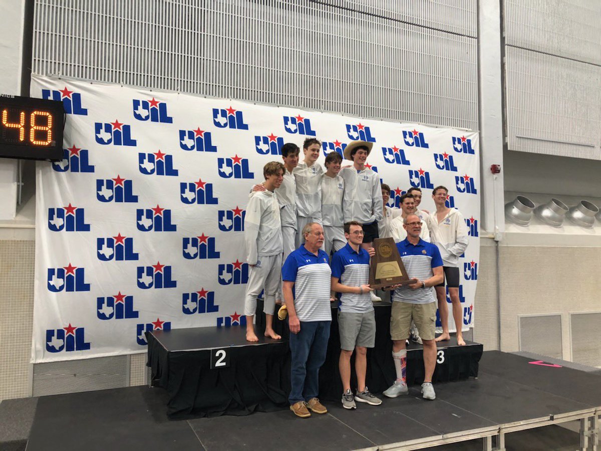 Kelly (far right) and his team take the team bronze at the UIL Texas Swimming and Diving championship.