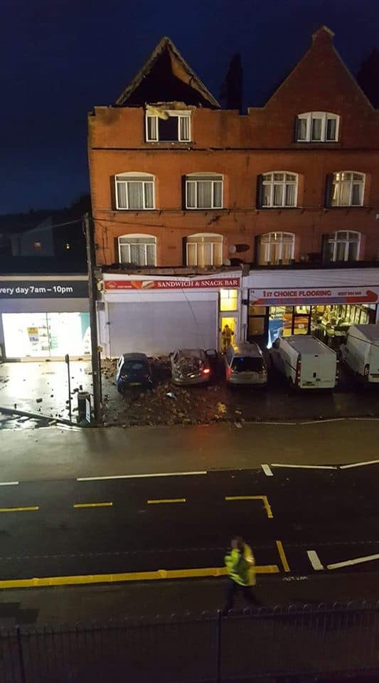 Kent_999s's tweet photo. HERNE BAY: Part of a building has collapsed onto vehicles near Tesco on Canterbury Road during #StormDennis Not known if there are any injuries. Pix FJ Mooney https://t.co/JBoRDKAMck