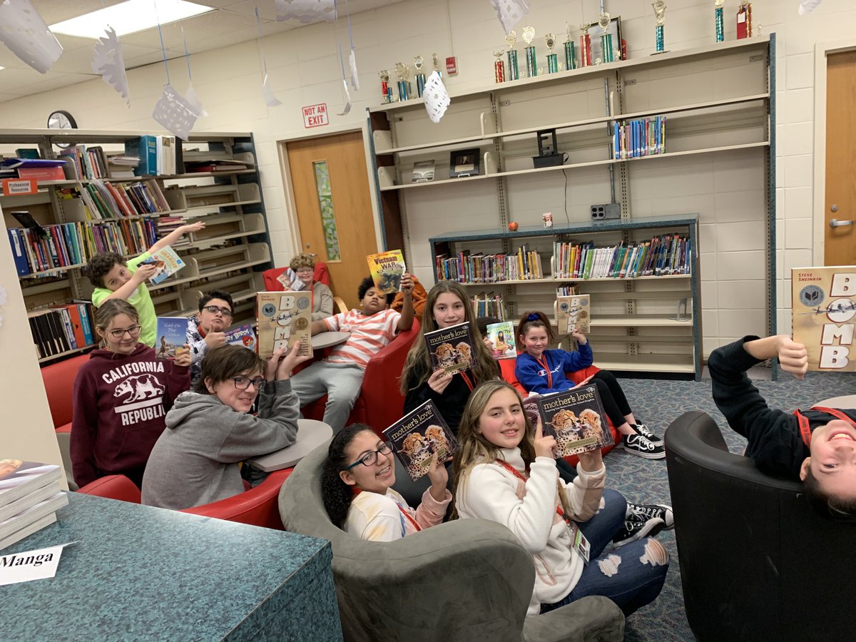 Mrs. Burke’s students showing their free RIFE books