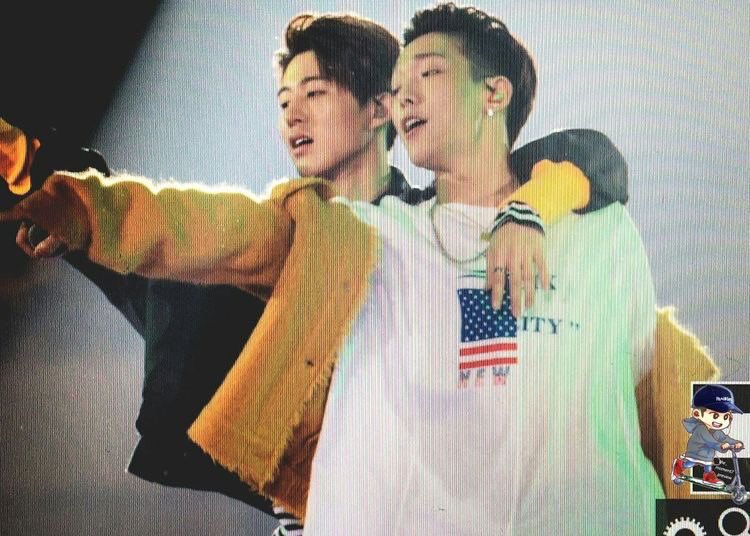 more of Double B with one arm around the shoulder 