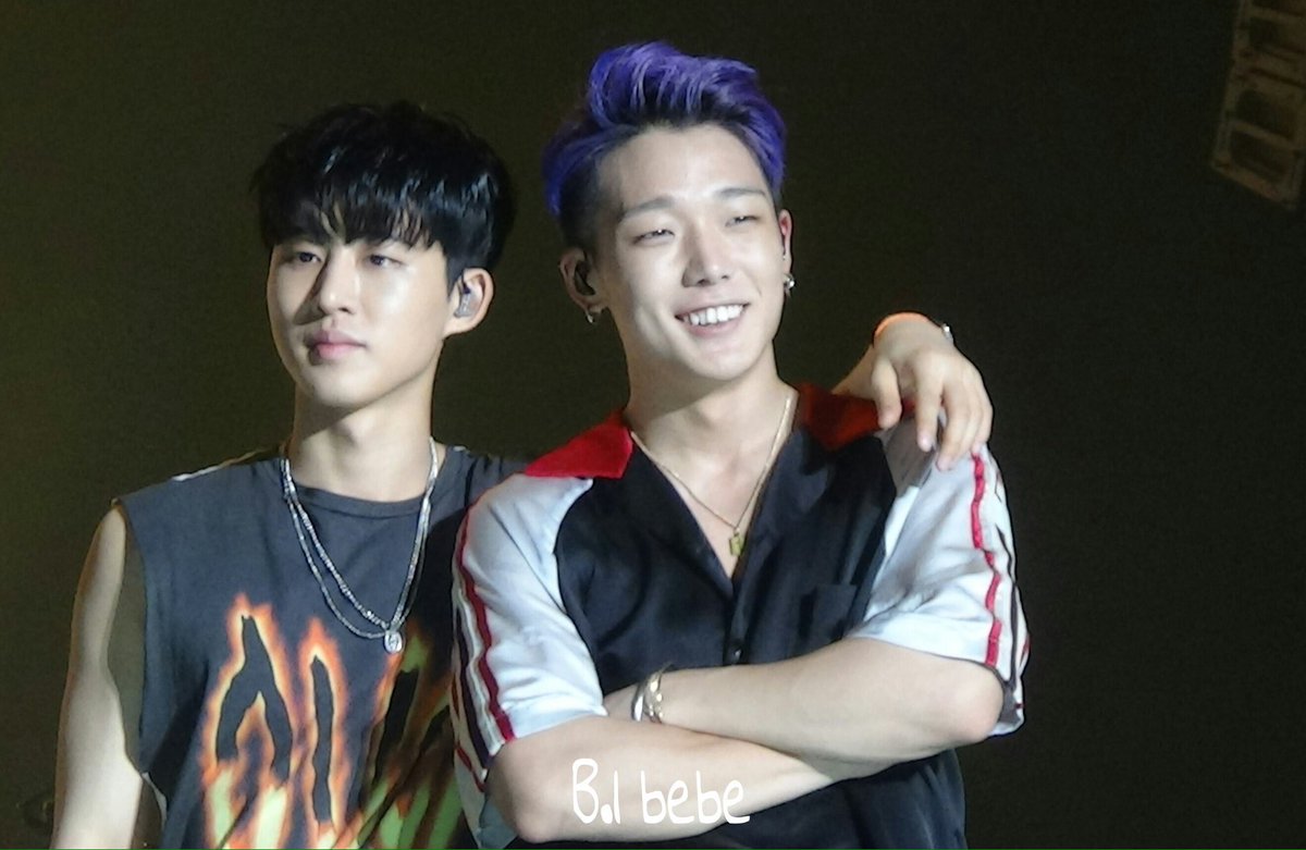 Double B with one arm around the shoulder 