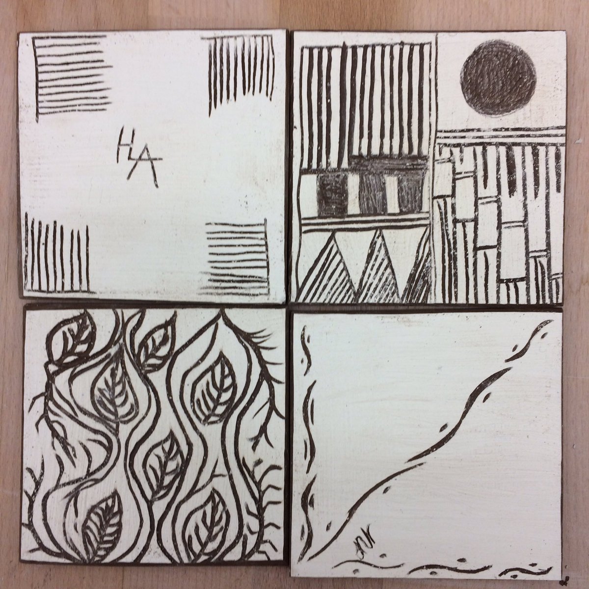 SE7Potter's tweet image. Tidying the edges of some lovely sgrafitto tiles made yesterday as a quick extra class project. #Making #ClayClasses #SE10