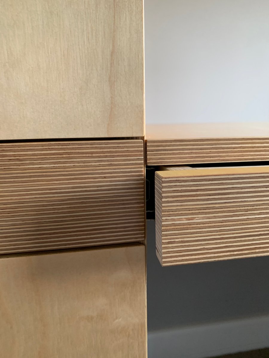 Some details of the drawers and the end grain Birch ply that runs around the whole bed, desk and wardrobe.  The mitred drawers have stood up well over the years.  #bespokewardrobes #bespokestorage #secretdrawer #birchply #smallbedroom #bespokebirchply #birchplyfurniture