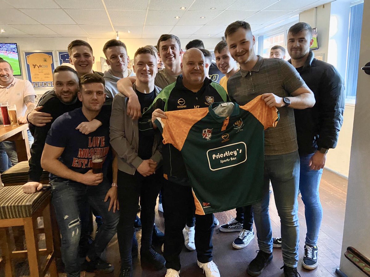 Big thank you to <a href="/priestleyssport/">Priestley's Bar</a> <a href="/mattdiskin/">Matt Diskin</a> Ellis James,Bar Manager at Priestleys Sports bar,seen here presenting the Polo tops to Mick Turner HW chairman, the bar are sponsoring the tops for the upcoming HW u23s tour to Malta in April <a href="/DewsReporter/">Dewsbury Reporter</a> <a href="/ThePressSport/">The Press Sport</a>