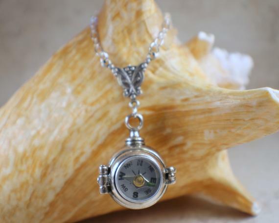 Just listed a new Compass Ball Locket, Hidden Compartment Locket, Silver Ball Locket, Secret Compartment Locket, Compass Jewelry, Ball Locket by CharsfavoritethingsEntryURL