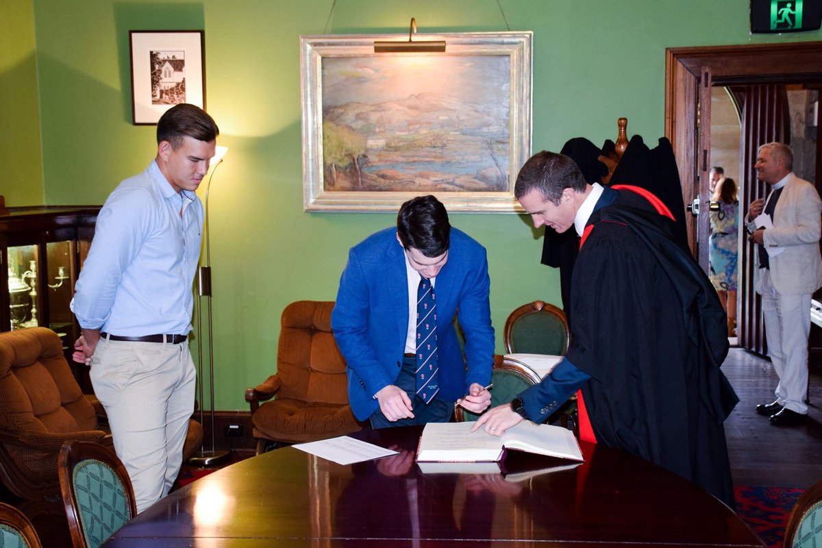 stpaulscollsyd's tweet photo. Welcome Week at Paul’s is under way, with Freshmen being greeted by student leaders. Students proceed to the Senior Common Room, where they mark the beginning of their journey by signing the College Register with the Warden, Dr Ed Loane, and the 2020 Senior Student, Max Sinclair https://t.co/vxnA9v0qkX