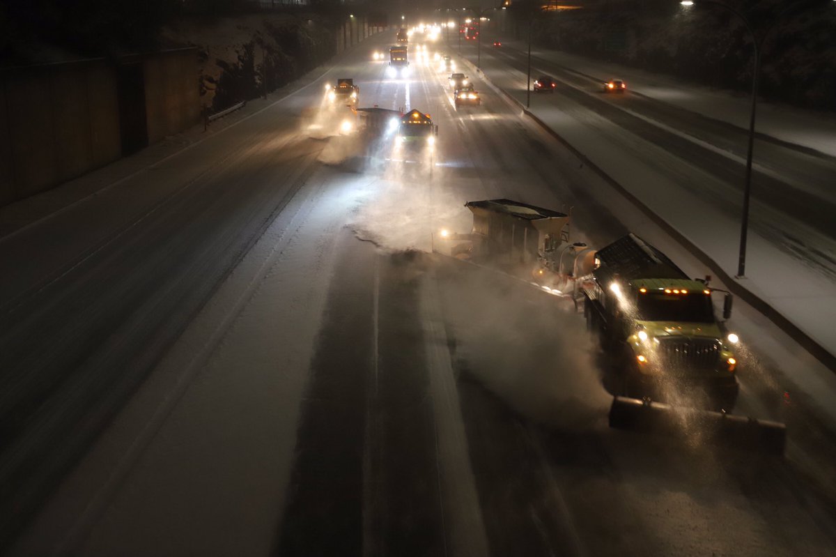 Two tow plows plowing I-90.