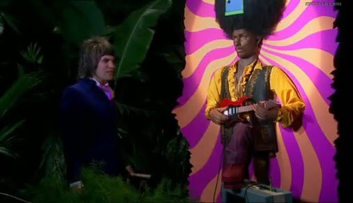 JiojiRavulo's tweet photo. Hey @ABC_COMEDY - watched my first episode tonight of The Mighty Boosh. Surprised that the character “Rudy” - is played by a white actor in blackface. Please consider how this perpetuates racial stereotypes whilst ridiculing POC &amp; their visual representations #NotHelpful @acrawsa https://t.co/jAUuEk7Rn3