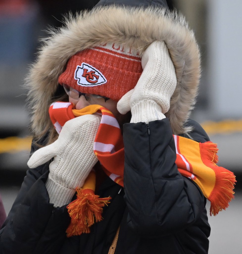 Waiting for #chiefsparade a fan tries to keep warm as wind kicks up. <a href="/KCStar/">The Kansas City Star</a>