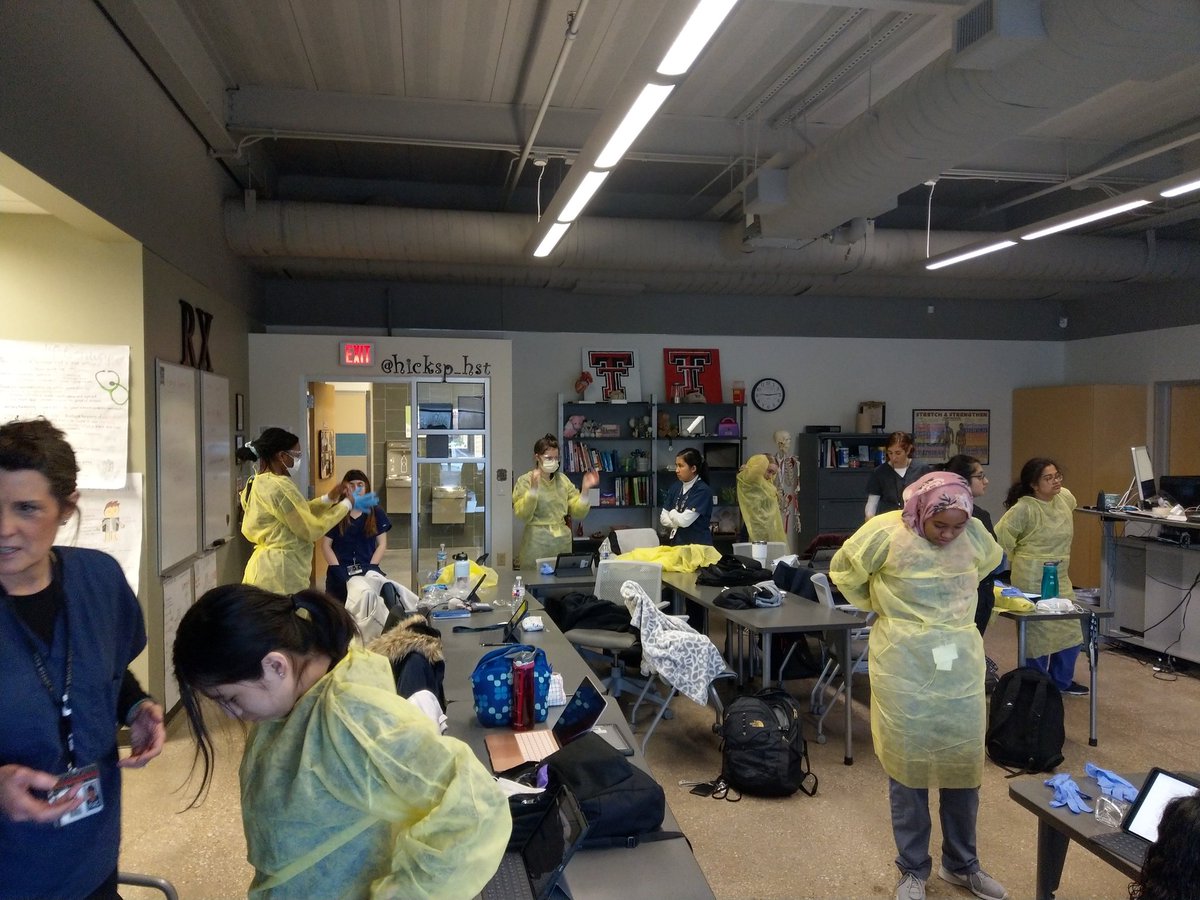 TECCeast's tweet image. TECC E Health Science Clinical students practicing proper donning of PPEs (personal protective equipment). @TECCeast @lisdcte