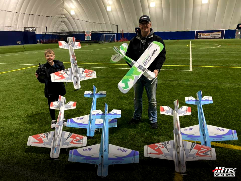 HitecMultiplex's tweet photo. Team Pilot Scott Bauerschmidt featured here flying indoors with his son Kyle. We are happy to see you pass the hobby to the next generation :) Keep Flying hard! #Hitec #Multiplex #FlyHard #Hobby #RadioControl #RC https://t.co/CWhaaZq4i4