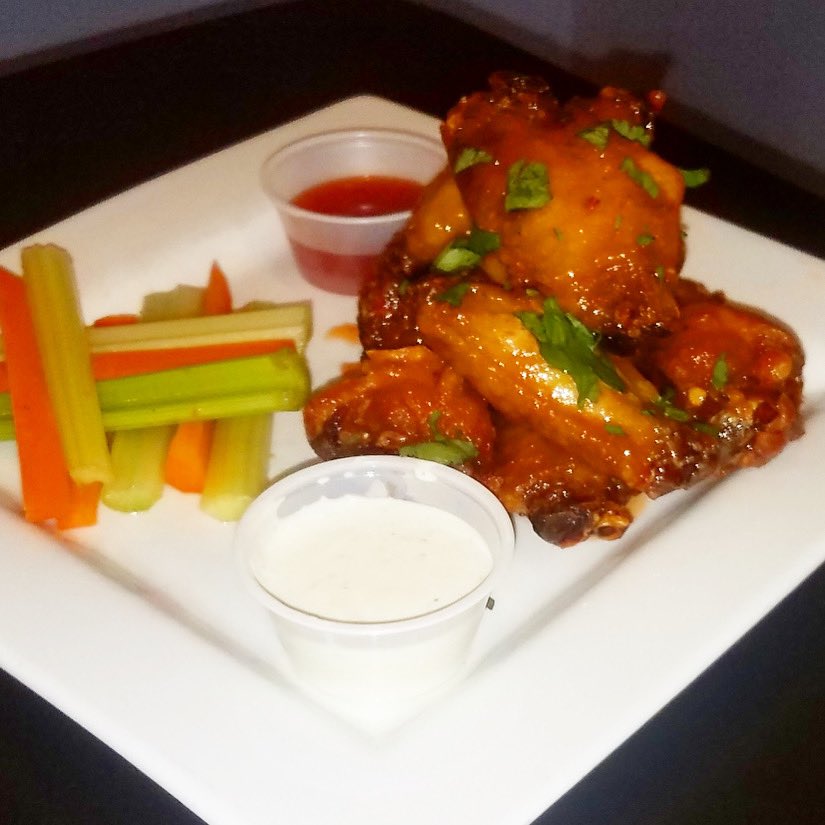 WEDNESDAY WINGS — Orange glazed chicken wings served with your choice of dipping sauce $10 with side