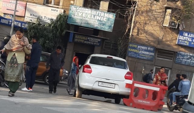 suryavanshvish's tweet photo. Jnb Ji is himself a traffic officer and see how and where he has parked his own vehicle outside Ranbir Library @Traffic_hqrs will u take a call plz. This is @JmuKmrPolice is a routine. Set an example b4 acting agnst 'aam admi'. Hope +ve action vl b taken in d morning #watchng https://t.co/Hv6Kb87XiC