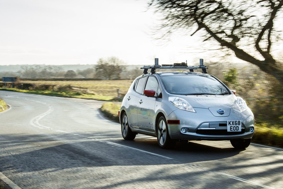 HumanDrive car driving along a country road.