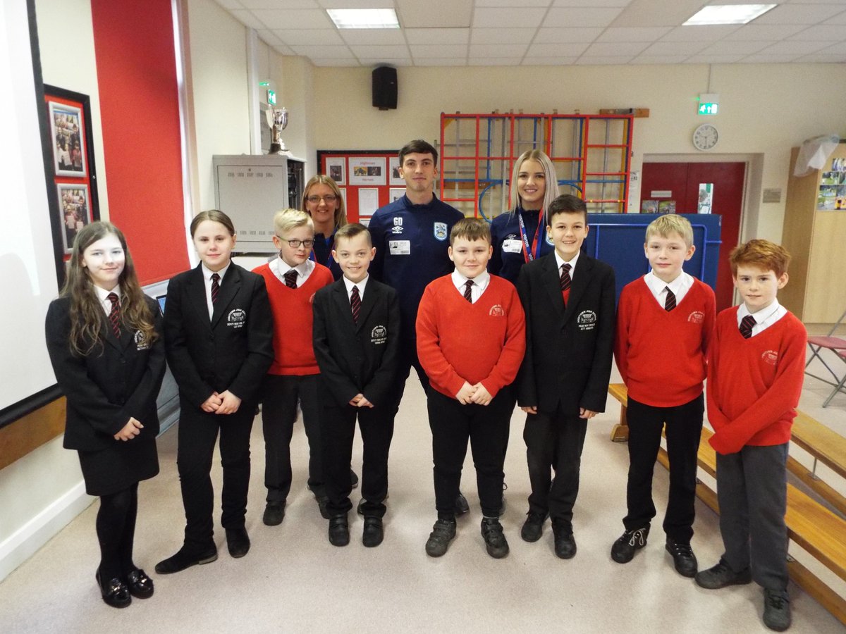 HightownJIN's tweet photo. Brilliant to have the HTFC team with us today as part of our world of work week. Big thank you to Charlotte and Lisa for coming along to breakfast club and special thanks to George for sharing his journey with the children #woww2020 #funtimes @htafcfoundation @htafcacademy https://t.co/CF3wpquAIU