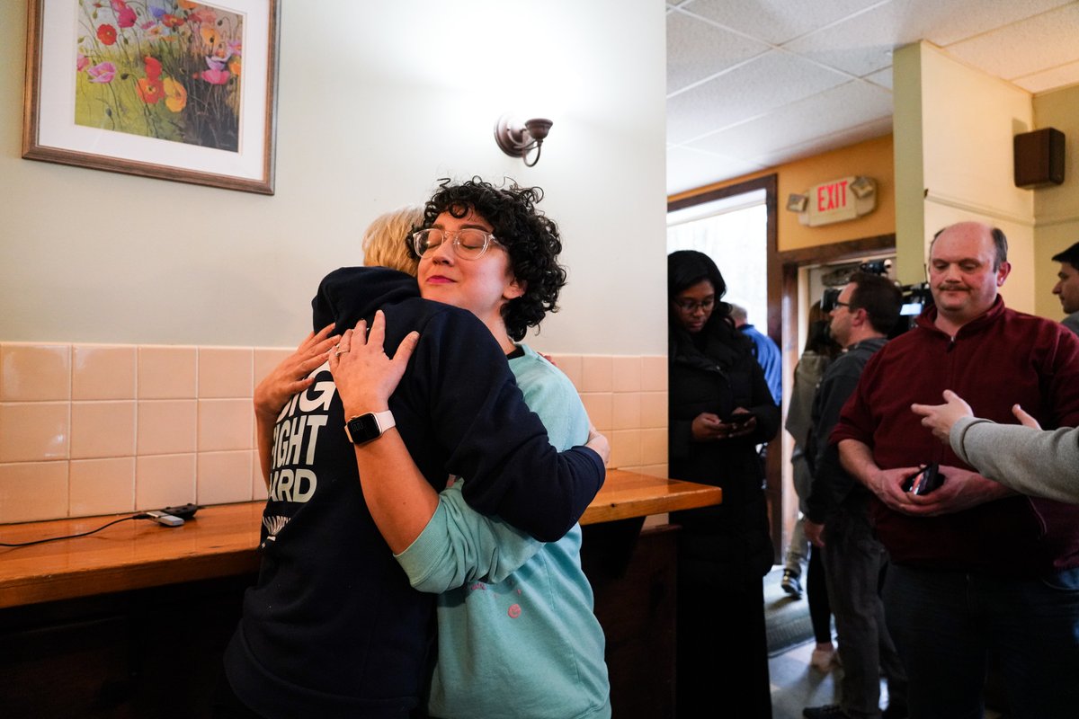 Elizabeth Warren hugs a supporter.