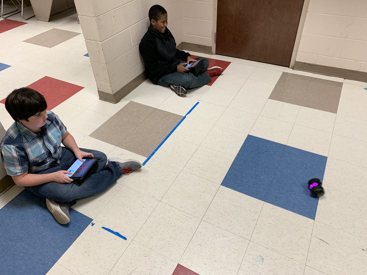 NLMS students using draw coding to work through the obstacles.