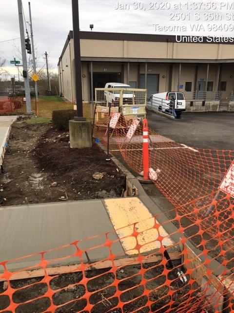 curb ramp into parking lot from sidewalk