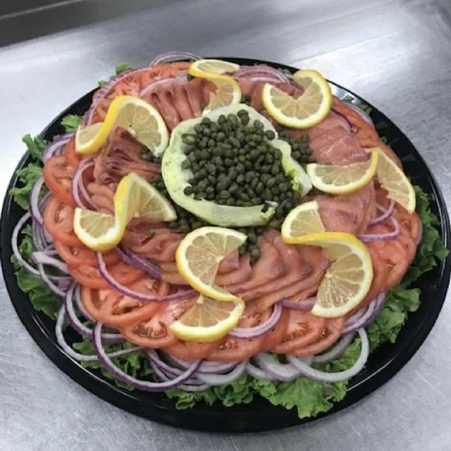 This is a lox platter that we offer at Blue Moon. Call ahead and we will gladly make it for you. Just tell us the amount of people that will invited to your function or meeting and let us do the rest. We do include bagels with this platter.  Hope to hear from you soon.