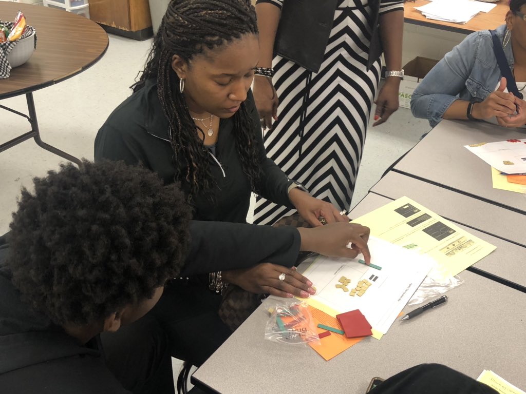 ConyersMiddle's tweet photo. Students help their parents while our #WorldClassEducators explain the hands-on Algebra Tiles Equations during Family Math Night. Awesome!๐๐ #CMSExcellence #LearningAndGrowing @RCPSFamEngage @MathRcps @RockdaleSchools #MathRocks https://t.co/Q27H0KVeWu