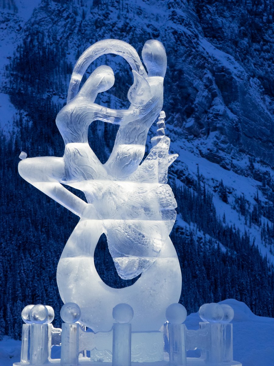 DRCFoto's tweet photo. The Dance. Lake Louise Ice Magic. #BanffSnowDays https://t.co/9Q2k86gNoL