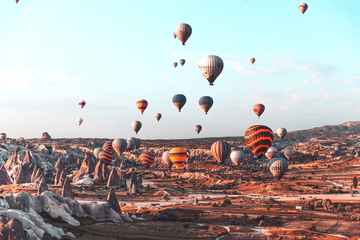 Marvel at the beautiful rock formation in Cappadocia, Turkey. Watch the sunrise as hundreds of hot air balloons take to the sky.

#guiddoo #guiddooworld #travel #tourism #landscape #turkey #cappadocia #sunrise #hotairballoon