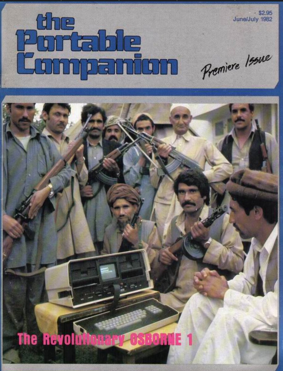 Magazine cover of Afghan rebels using an Osborne portable computer in 1982.