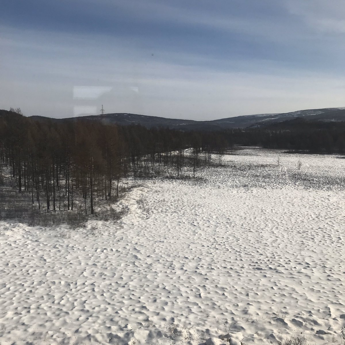 Next stop was 5 hrs later - Mogocha. We are winding along pretty close to the Chinese border towards the Amur region. The rivers are all frozen solid and the roads are all snow-covered mud.