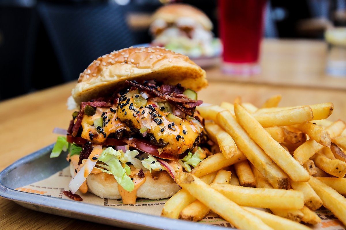 A NEW MENU IS LANDING 🎉 From tomorrow, the Mac 10 is becoming a permanent resident alongside some brand new specials and sides🤤

Pictured is the Mac 10: 2 x 3oz beef patties, American cheese, gherkin and jalapeño relish, crispy bacon bits, Mac 10 burger sauce 🙌🏼