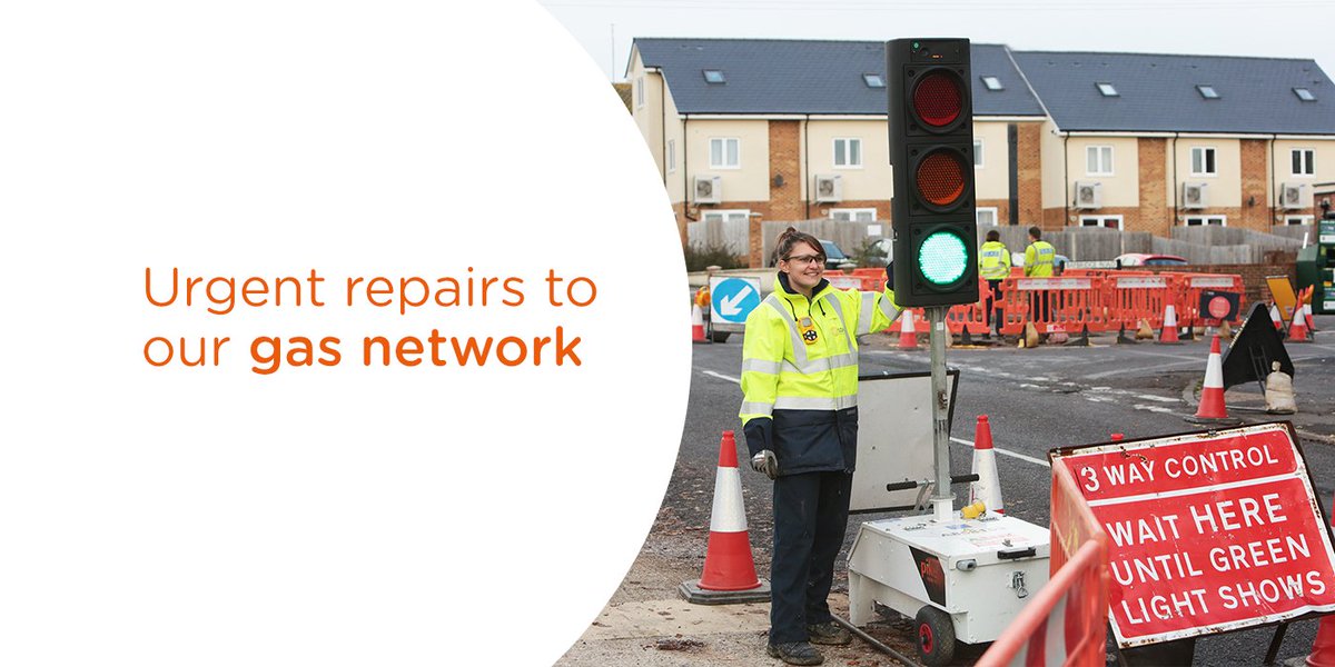 Urgent repairs to our gas network. Image shows SGN engineer operating traffic lights