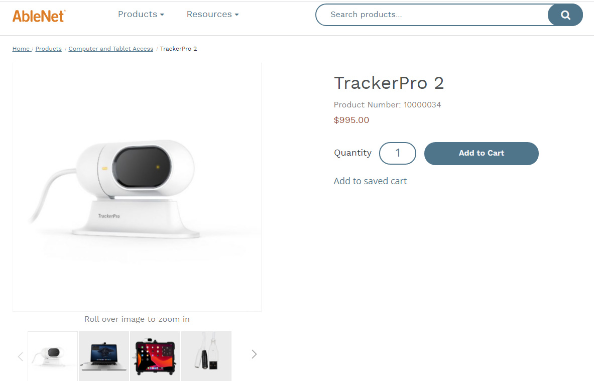 The TrackerPro is a mounted camera that tracks a reflective dot on the user’s forehead. The unit is in a white case.