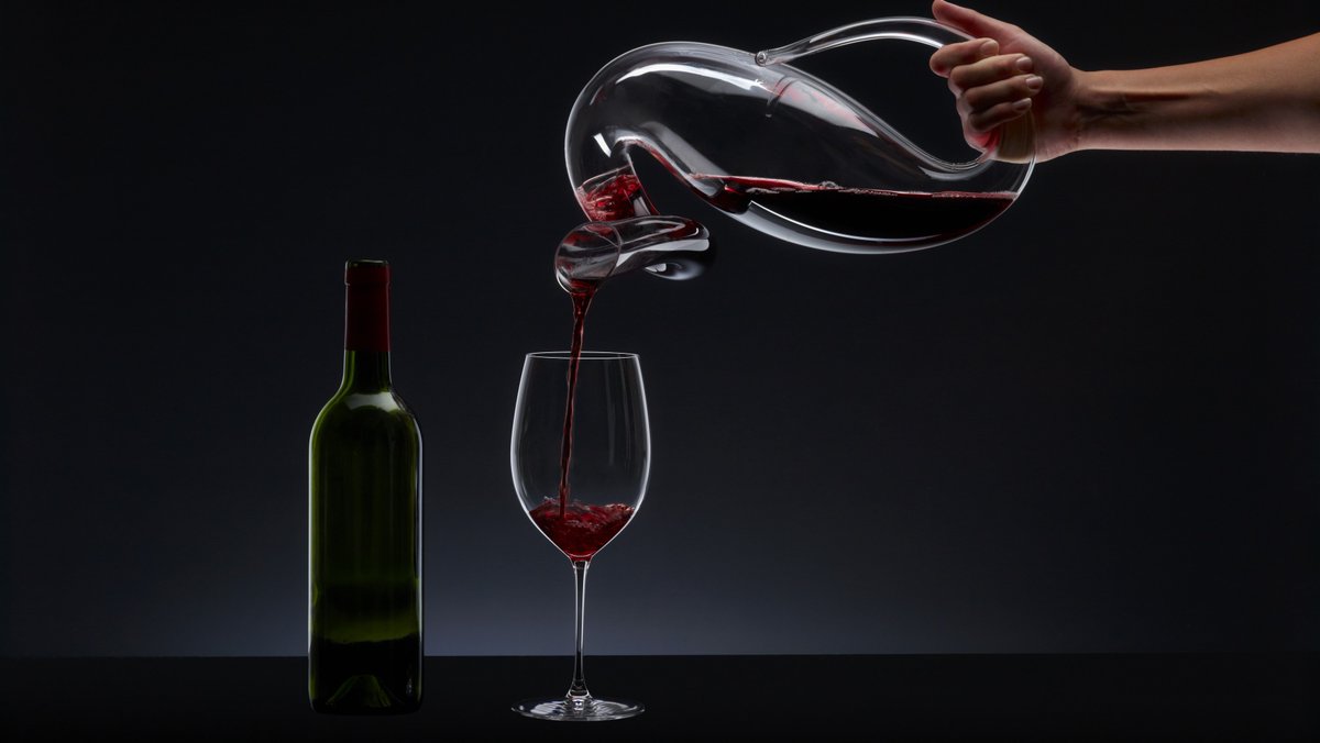 Why decant?  Decant older wines to remove sediment, and because the wine has been trapped in a tight container for a long period of time.  Exposure to air is beneficial because it allows the wine to breathe and to give a full expression of fruit.