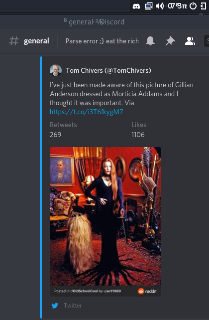 the system text on the clock and title bar of discord are messed up. but the content of discord is gillian anderson dressed as morticia addams which is anything but messed up