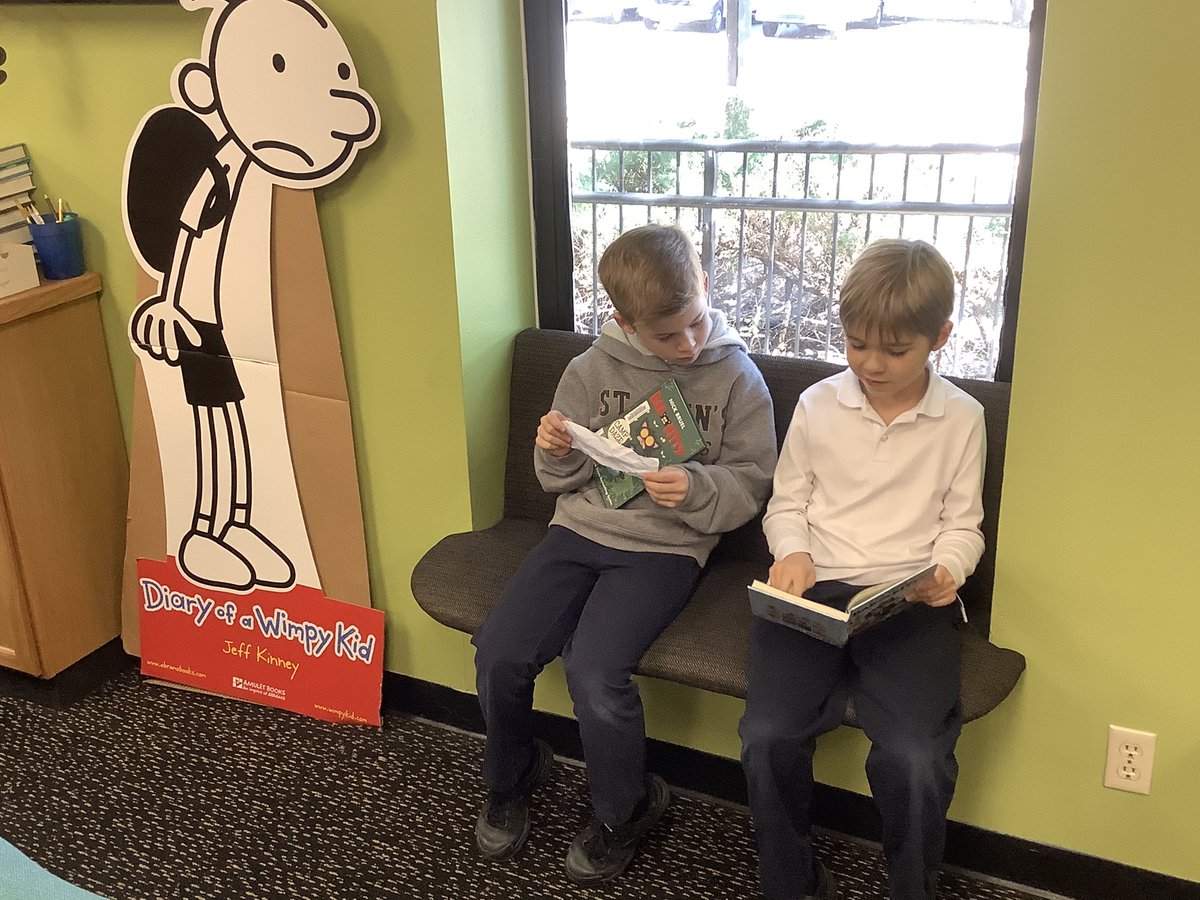 FunkyFirsties's tweet photo. Library benches and streaming sunlight make reading with first grade friends terrific today!#sjesdallas https://t.co/q9ugH6DrEx