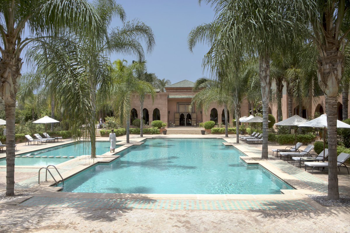 Picture it, a warm #pool, some nice palm trees and lots of sun... that’s your #holiday at #hotel Palais Aziza &amp; Spa!
