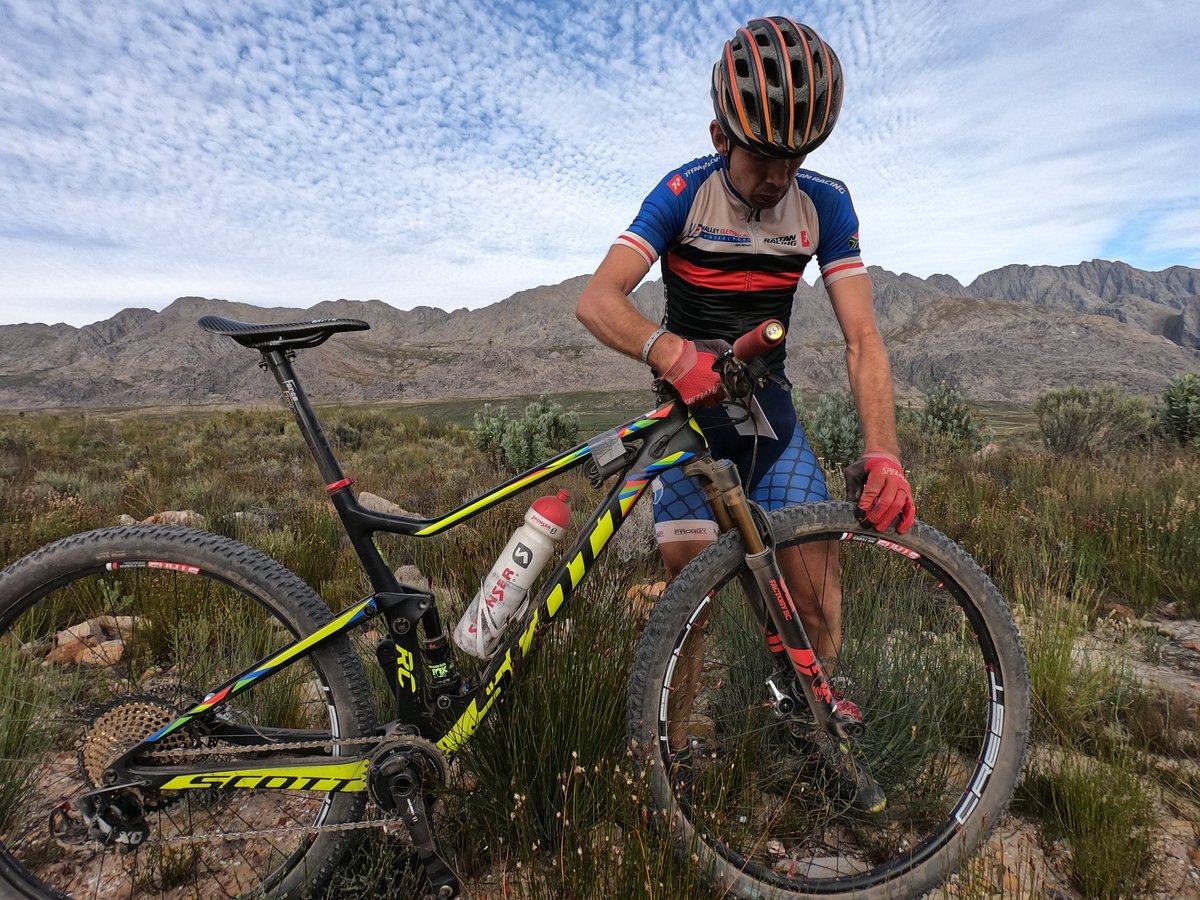 tankwatrek's tweet photo. Today featured a puncture or two. Here Sebastian Stark &amp; @Robhobbers plug a sidewall cut &amp; a hole in the tread during Stage 2 of the @Momentum_za Medical Scheme #TankwaTrek, presented by @BiogenSA. https://t.co/6I9NnGnT4m
